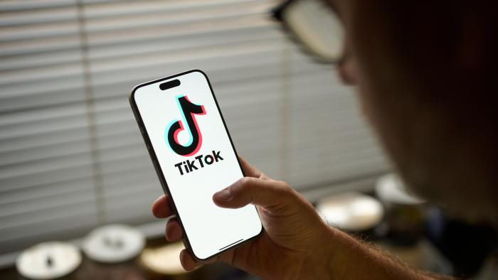 The TikTok app logo is seen in this photo illustration taken in Warsaw, Poland on 18 November, 2024. The Canadian government has ordered the social media giant to wind down its business operations in the country. The decision, announced on Nov. 7, is based on national security concerns tied to TikTok's Chinese ownership and follows a year-long review of the app's Canadian operations. (Photo by Jaap Arriens/NurPhoto via Getty Images)