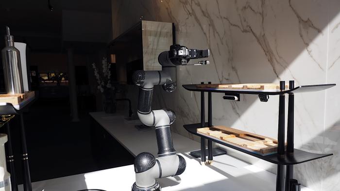 Image of the Moley Robotics X-AiR kitchen robot while cooking.
