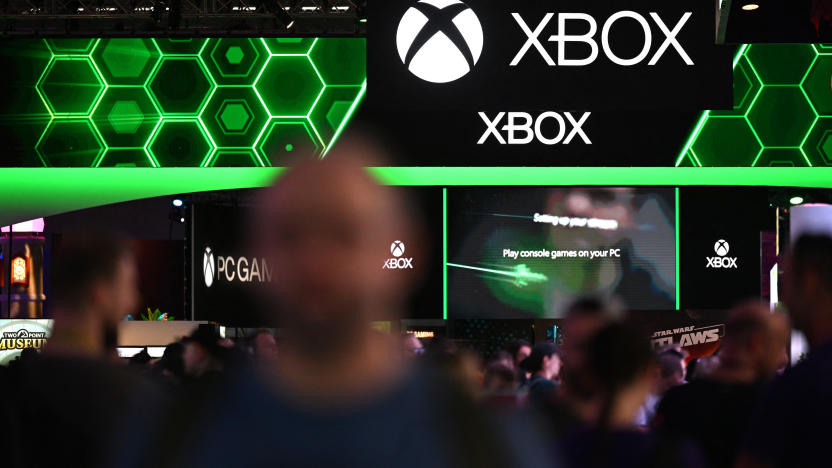 Visitors walk past the Xbox booth at the Gamescom video games trade fair in Cologne, western Germany on August 22, 2024. According to organisers, around 1400 exhibitors from 64 countries will be presenting their products during the fair running until August 25, 2024. (Photo by Ina FASSBENDER / AFP) (Photo by INA FASSBENDER/AFP via Getty Images)