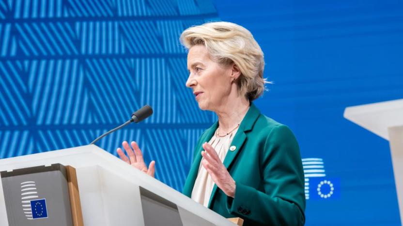 European Commission President Ursula von der Leyen standing at a podium