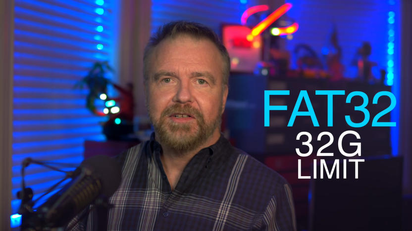 Retired Microsoft engineer Dave Plummer looking into the camera with overlaid text "FAT32 32G LIMIT."