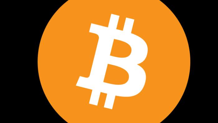 A Bitcoin logo in an orange circle against a black background.