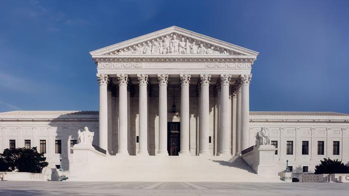 Straight-on shot of the US Supreme Court building.