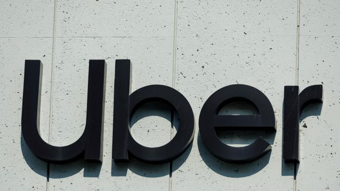 FILE PHOTO: The Uber logo is shown on the building in Los Angeles, California, U.S., February 14, 2024.  REUTERS/Mike Blake/File Photo